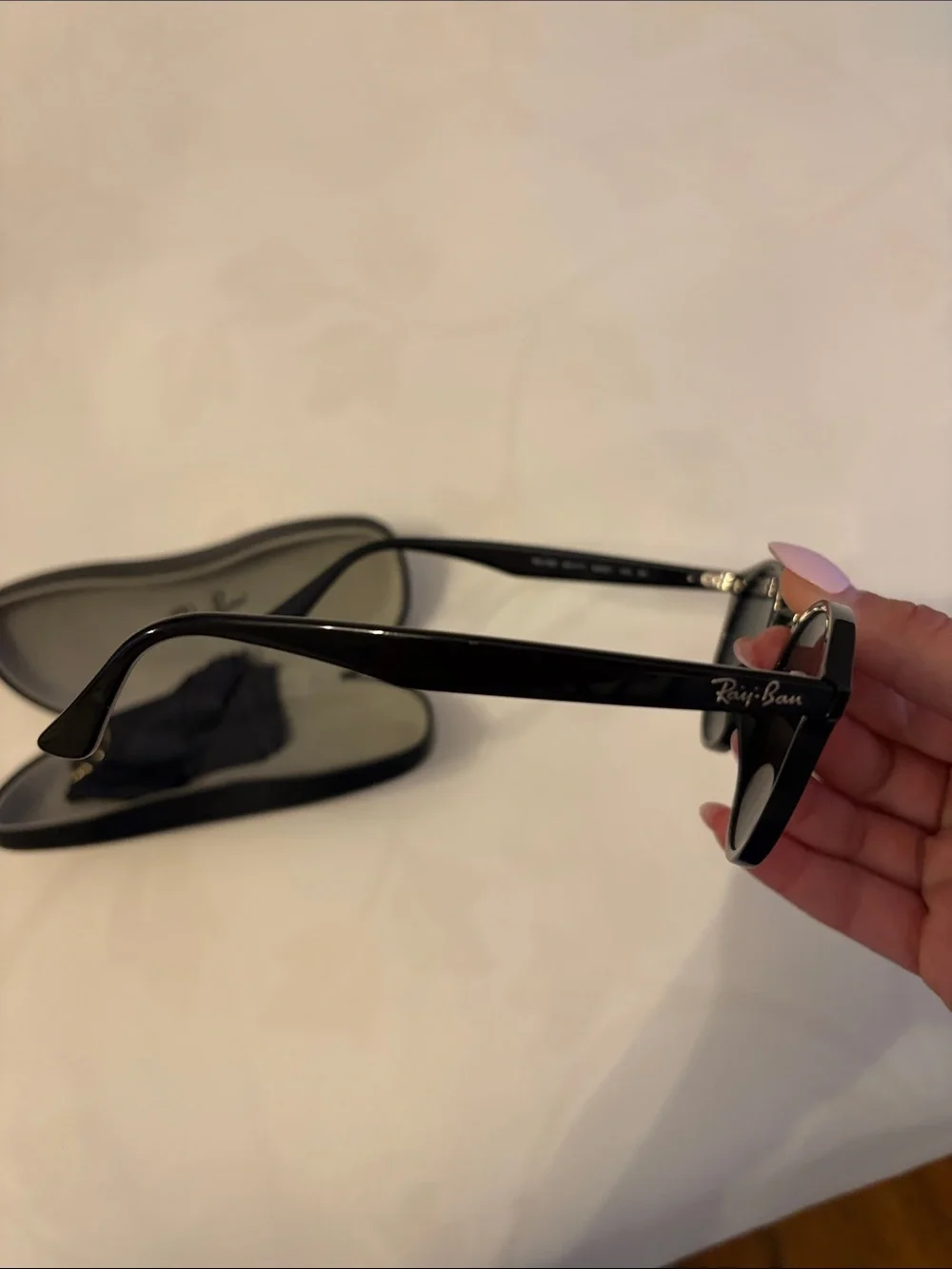 Ray-Ban Black Frame Green Lens Round Sunglasses RB2180